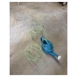 Two flower pot stands with flour watering jug