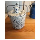 This vintage-style stoneware crock features a