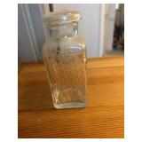 This is a vintage Dryden & Palmer rock candy jar