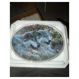 This is a decorative oval collector plate