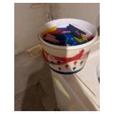 Bucket of clothes hangers