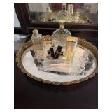 A lot of perfume bottles with tray