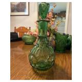 This vintage emerald green glass decanter is a