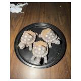 Three decorative turtles