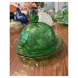 This emerald green glass covered butter dish