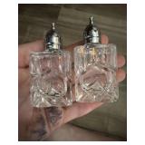 These are vintage clear cut glass salt and p