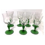 7 Goblets with green stems