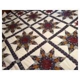 Hand-Pieced Patchwork Quilt with Star Motif