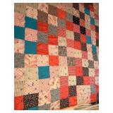 Patchwork Quilt with Geometric and Floral Patterns