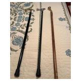Three Walking Canes with Decorative Handles