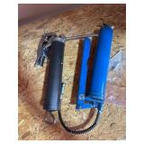 Two Manual Grease Guns With Accessories