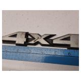 Block Letter 4x4 Emblem/Badge, Likely from Jeep