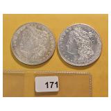 Two AU Morgan Silver Dollars