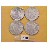 Four Peace Silver Dollars