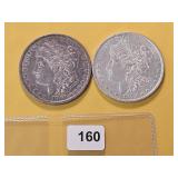 Two AU Morgan Silver Dollars