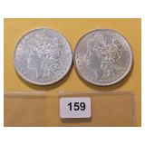 Two AU Morgan Silver Dollars