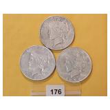 Three Circulated Peace Silver Dollars