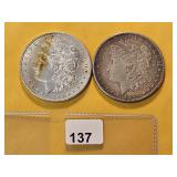 Two AU Morgan Silver Dollars
