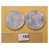 Two AU Morgan Silver Dollars
