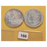 Two AU Morgan Silver Dollars