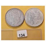 Two AU Morgan Silver Dollars