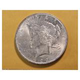 AU+ 1924 Peace Silver Dollar