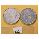 Two AU Morgan Silver Dollars