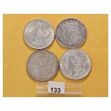 Four AU Morgan Silver Dollars