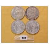 Four AU Morgan Silver Dollars