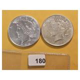Two Circulated Peace Silver Dollars