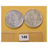 Two AU Morgan Silver Dollars