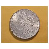 AU+ 1885 Morgan Silver Dollar