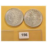 Two AU Morgan Silver Dollars