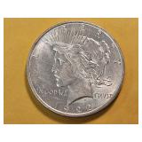 AU+ 1922-D Peace Silver Dollar