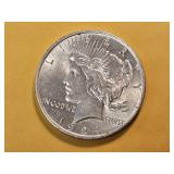 AU+ 1924 Peace Silver Dollar