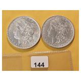 Two AU Morgan Silver Dollars