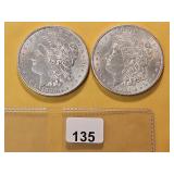 Two AU Morgan Silver Dollars