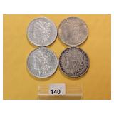 Four AU Morgan Silver Dollars