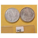Two AU Morgan Silver Dollars