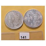 Two AU Morgan Silver Dollars