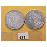 Two AU Morgan Silver Dollars