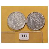 Two AU Morgan Silver Dollars