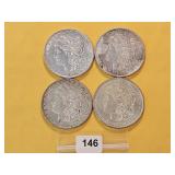 Four AU Morgan Silver Dollars