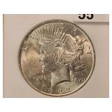 NGC 1922 Peace Silver Dollar in MS63