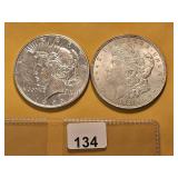 Two AU US Silver Dollars
