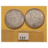 Two AU Morgan Silver Dollars