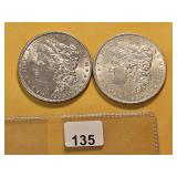 Two AU Morgan Silver Dollars