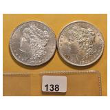 Two AU Morgan Silver Dollars