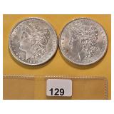 Two AU Morgan Silver Dollars
