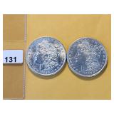 Two AU Morgan Silver Dollars